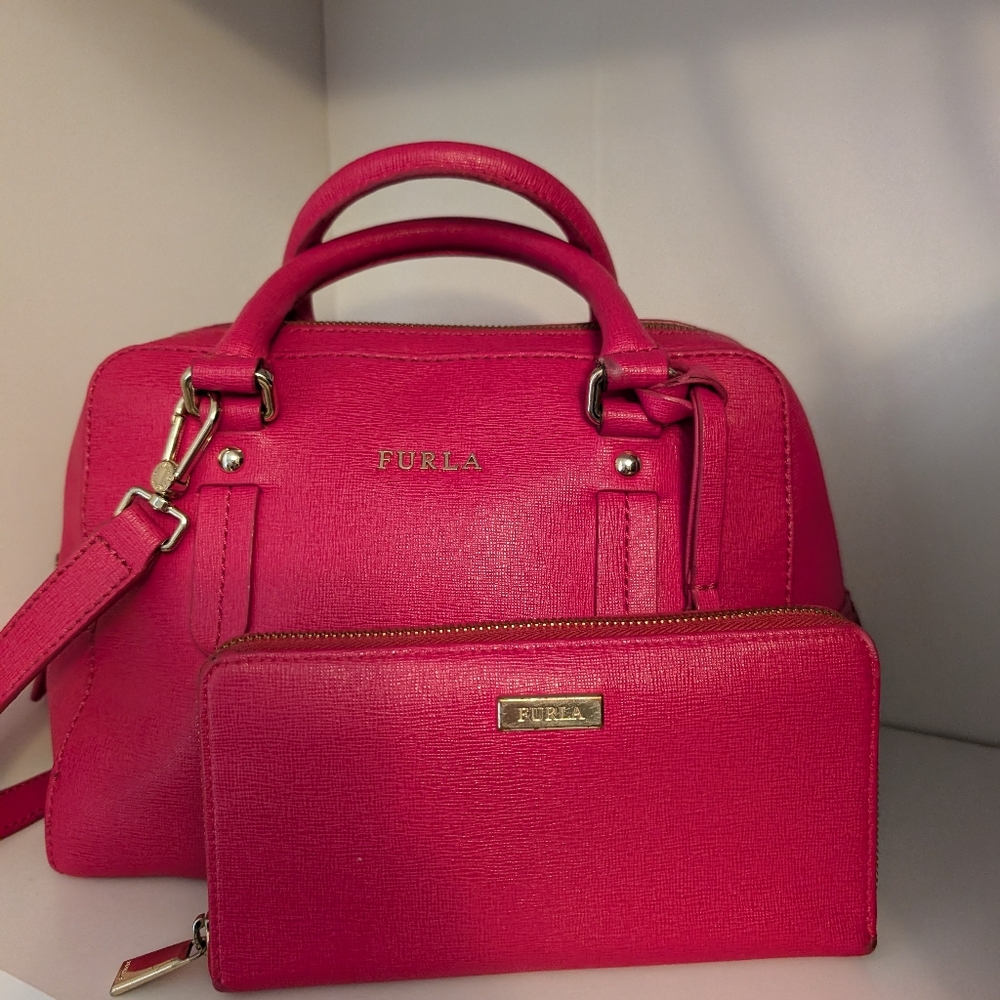 Furla pink satchel with crossbody strap. With matching zippy wallet.